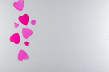 Hand-made pink love hearts isolated on white wooden texture background, Happy valentine's day. holiday background, Flat lay, top view, copy space