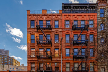 New-York building facades with fire escape stairs