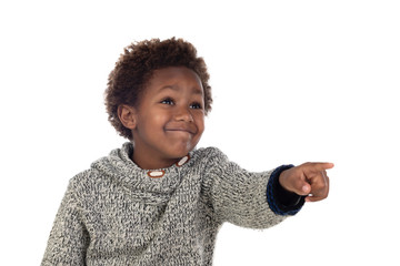 Cute kid pointing with his finger at camera