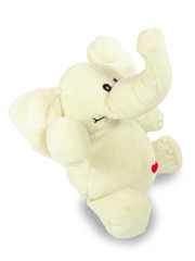 Valentine's holiday, red heart, white plush elephant, sits