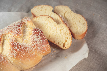Fresh bread on paper background. Copy text.