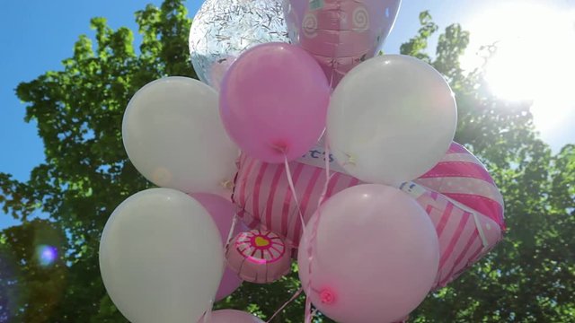it is a girl balloons. pink and white baloons for new born girl