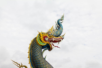 naga statue with gray cloud