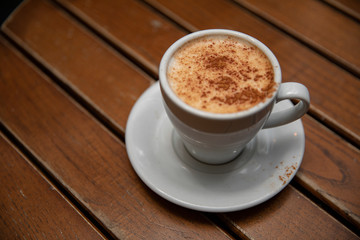 Cup of Sahlep on Wooden Table