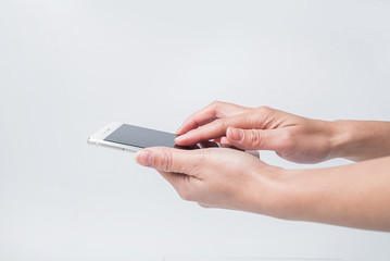 Asian female hand holding mobile phone / internet communication background material