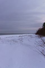 Snow covered sea beach on the shores of the Gulf of Riga in Latvia