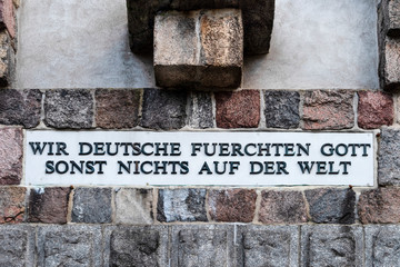 Germany, Pritzwalk: Detail of famous Bismarck tower with quotation: We Germans fear God, but...