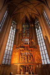 Interior of St. James Church in Rothenburg Ob der Tauber, wooden behind the altar the image of the...
