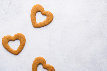 Valentine's Day background with heart shaped cookies.