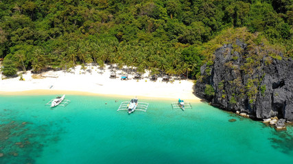 boat in a lagoon in aerial view, El Nido Philippines	