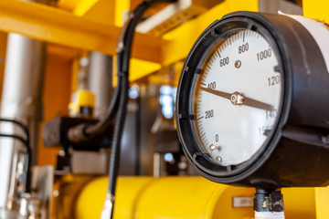 Pressure gauge or pressure indicator reading four hundred pressure square inch (psi)  in offshore oil and gas refinery process operation industry.