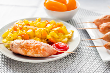 Stewed vegetables with turmeric and cumin and turkey kebab