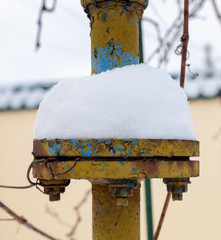  fragment of an old yellow gas pipe