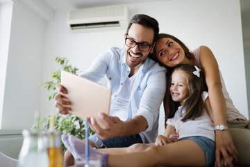 Obraz premium Happy family having fun time at home