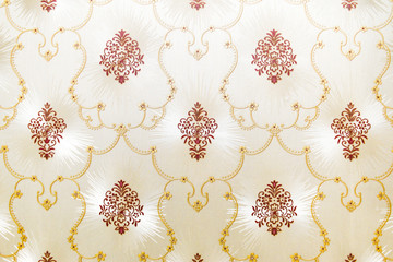 Textured paintings on a wall.