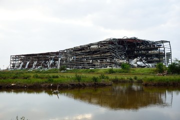 Late August 2017 Hurricane Harvey, major wind damage and destruction to boat storage steel building in Rockport, Texas / USA.	