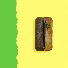 Halves of wheat and rye bread are connected with zipper