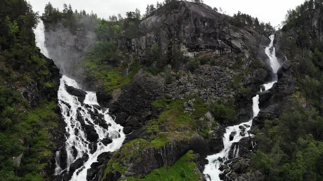 Aerial view. Norwegian landscape. Twin waterfall Latefoss or Latefossen in summertime, Odda Hordaland County in Norway. National tourist Hardanger road 13