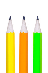 Colored pencils on the white isolated background. multi-colored pencils close up