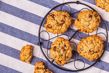 Homemade oatmeal cookies with cranberries and pumpkin seeds.