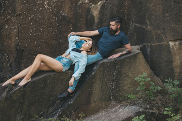 Joy of being in love. Sexy woman and bearded man on natural landscape. Sensual couple on vacation trip. Couple in love on summer vacation. The best romantic vacation for couple