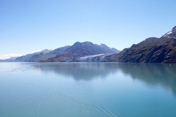 Glacier Flowing Into Lake In Alaska USA