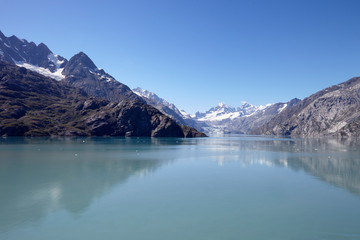 Glacier Flowing Into Lake In Alaska USA
