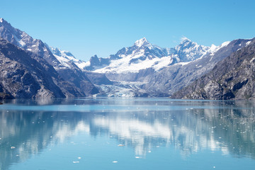 Fototapeta na wymiar Glacier Flowing Into Lake In Alaska USA