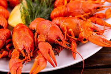 A plate with boiled crayfish