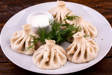 Khinkali with pepper and sour cream