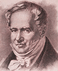 Alexander von Humboldt portrait on East German 5 mark (1964) banknote close up macro. Famous German...