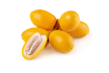 yellow raw date palm isolated on white background