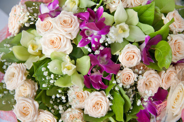 Bouquet of roses and orchids.