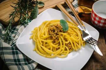 homemade bigoli cooked with duck meat sauce