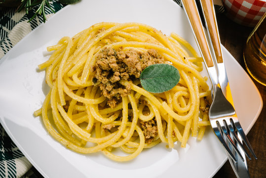 homemade bigoli cooked with duck meat sauce