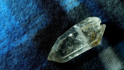 Black phantom quartz on wool background with space for write wording, rare item lucky stone  for decorating for making accessories such as bracelet with belief of lucky, health, wealthy and meditation