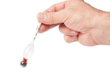 Alcohol Meter Hydrometer in a Hand