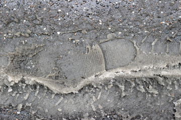 Snow footprint tracks shoe imprint dirty slushy street sidewalk texture surface