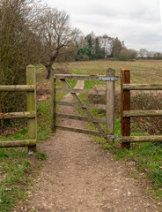 Small gate on path in rural countryside