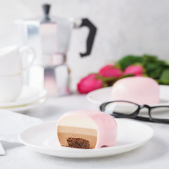 Trendy mousse cakes with pink mirror glaze. Heart shaped.