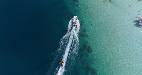  boat with banana in a lagoon in aerial view, Papeete French Polynesia