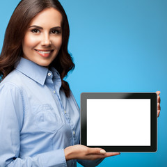 Businesswoman showing blank tablet pc, on blue