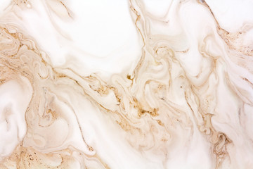 delicate marble background in light brown colors, mix of paints