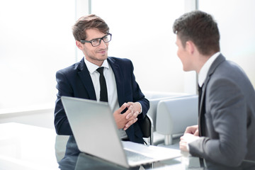 business colleagues sitting at the Desk