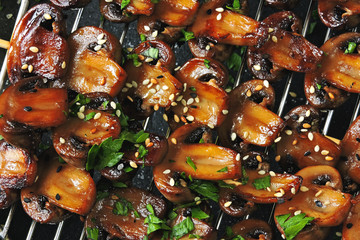 Skewers with mushrooms. balsamic grilled mushroom. Vegan mushroom skewers with parsley and garlic.