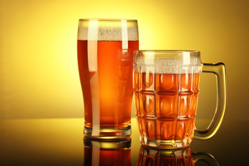 Two Beer Mug / Glass with froth with reflection