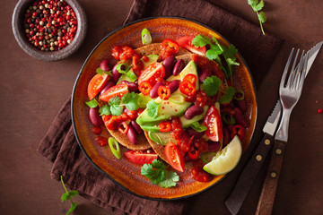 mexican avocado bean sandwich with tomato chili scallion