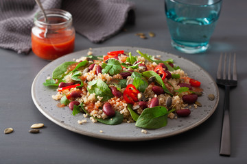 healthy bean and quinoa salad with spinach, chili