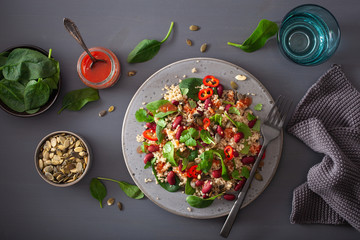 healthy bean and quinoa salad with spinach, chili