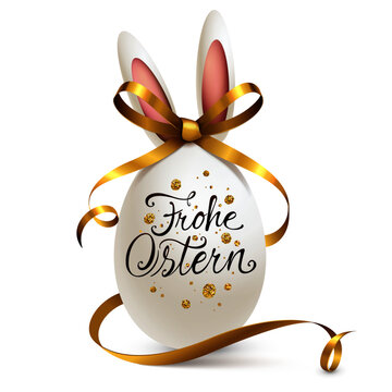 Osterei mit Kalligraphie, Goldschleife und Hasenohren - Frohe Ostern